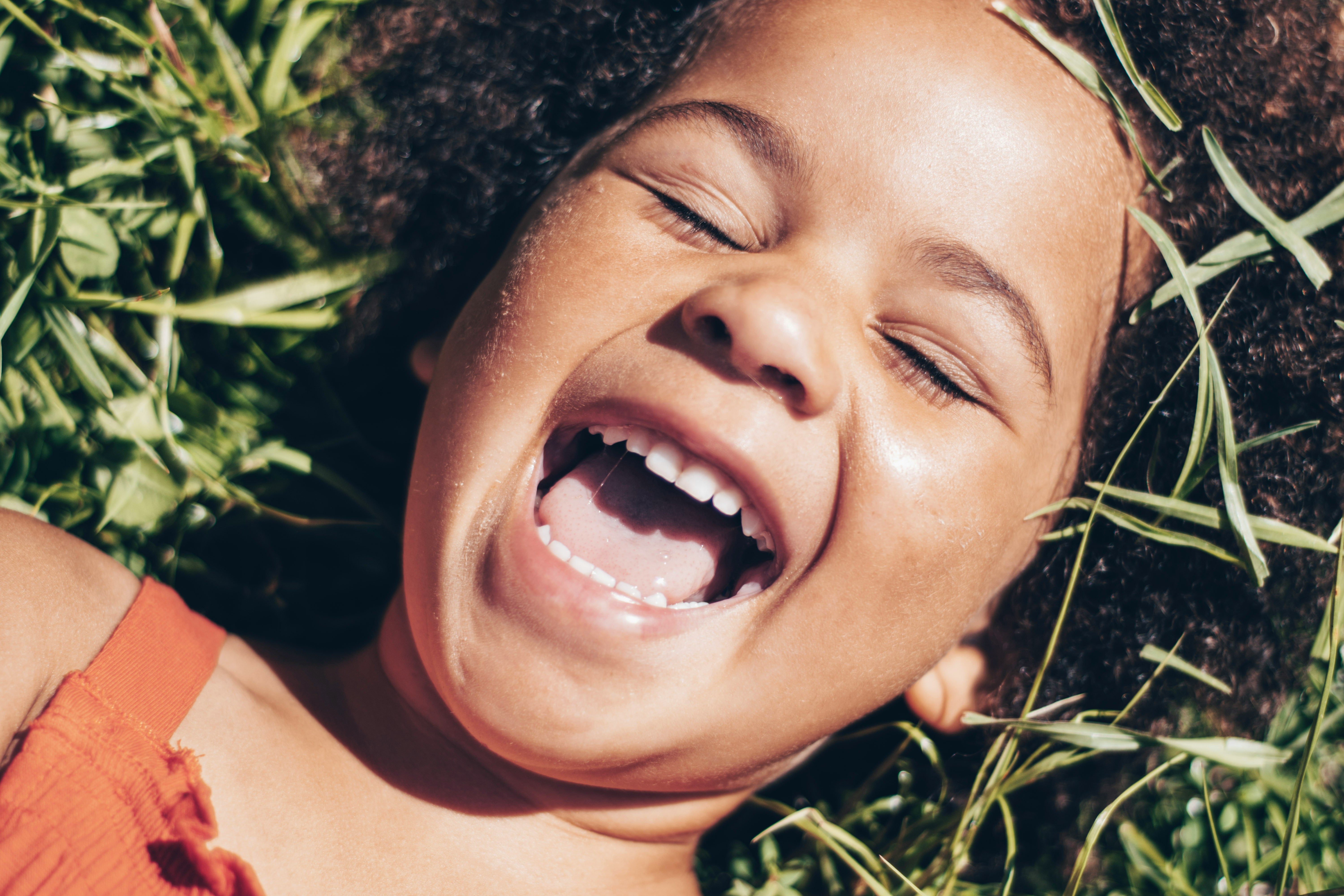 Happy child playing outdoors